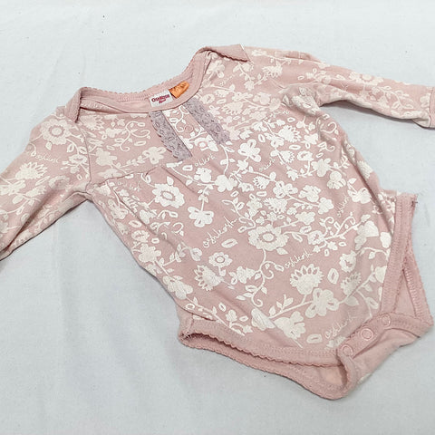 Oshkosh bodysuit size 3-6 months (pink with white floral)